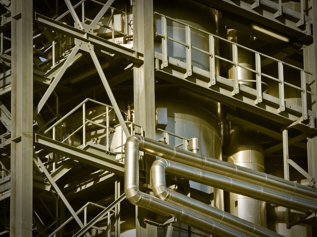 An industrial processing plant with steel structure and pipework
