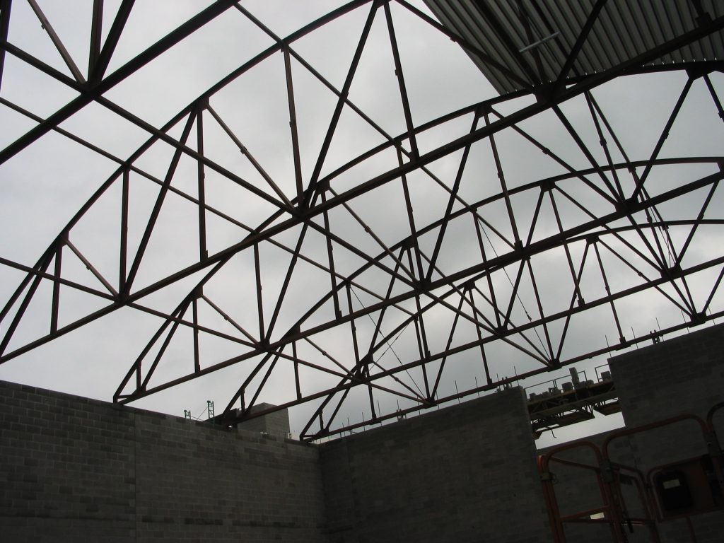 Institutional school steel fabrication drawings — curved structural steel addition