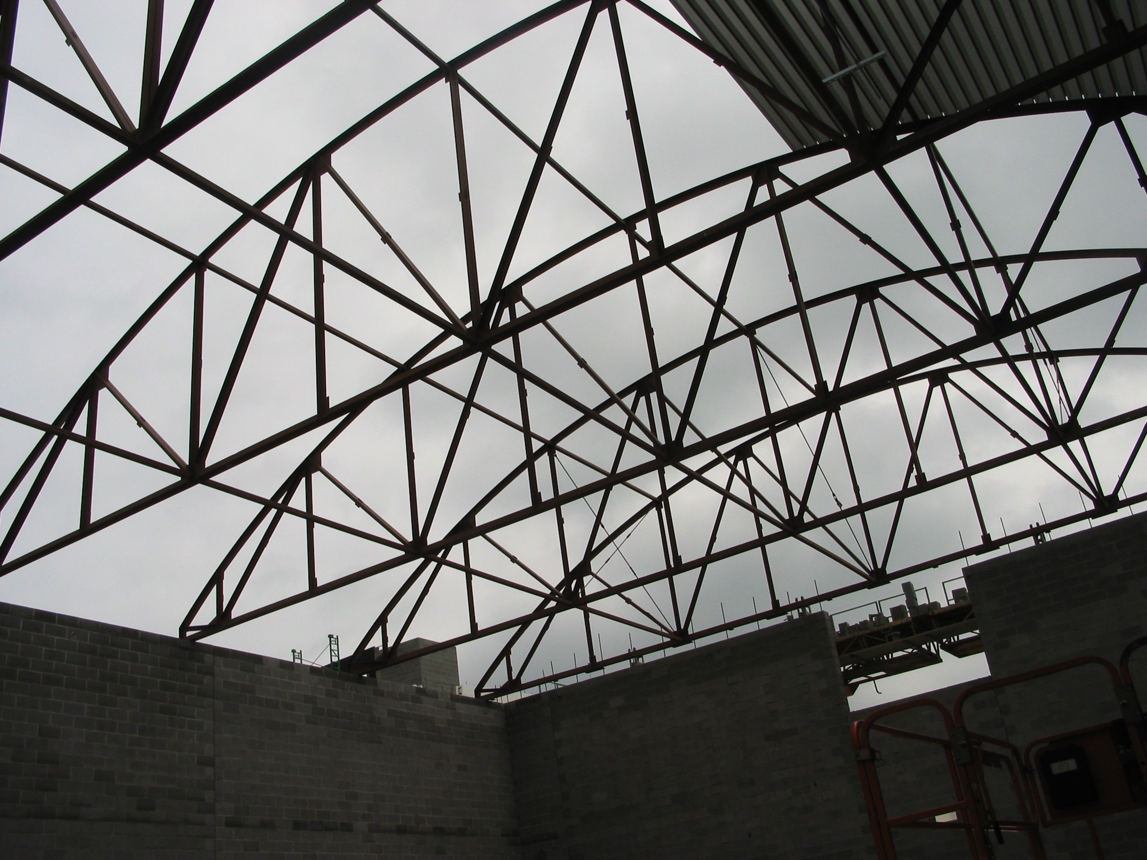 Institutional school steel fabrication drawings — curved structural steel addition