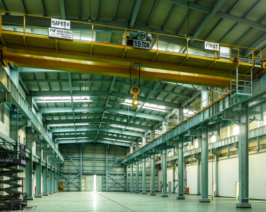 Industrial warehouse interior with an overhead crane